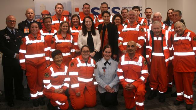 The Mosman SES members with local controller Vanden Helby (left), SES Deputy Commissioner Greg Newton, MP Felicity Wilson and Mosman Mayor Carolyn Corrigan (middle).