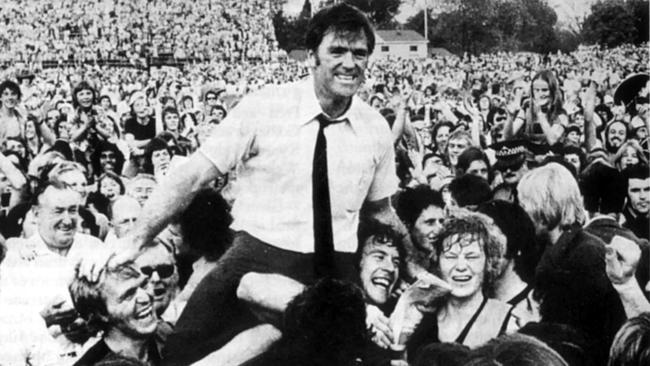 Glenelg football coach Neil Kerley being chaired off carried by Graham Cornes and Fred Phillis after the Tigers won the 1973 SANFL premiership.