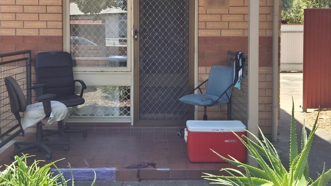 A blood stain on the edge of a porch of one of the apartments at the Torrens Rd complex. Picture: Dasha Havrilenko