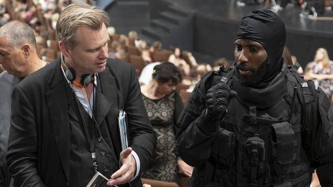 Christopher Nolan on set with John David Washington