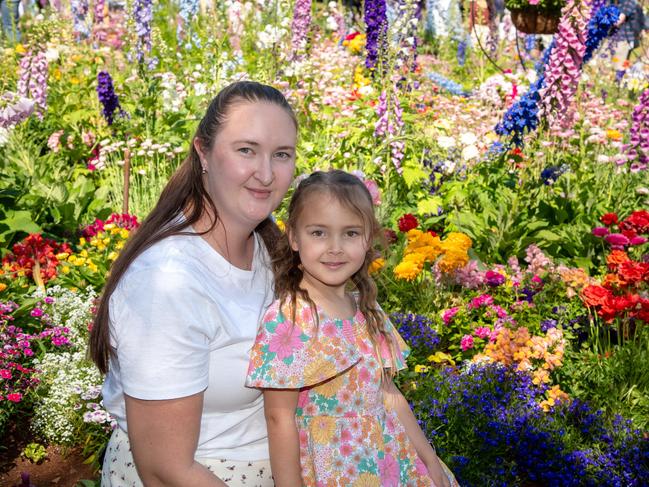 Kaitlyn Podesta and her daughter Grace Podesta in the Botanic Gardens, Queens Park during the Carnival of Flowers, Sunday September 22, 2024. Picture: Bev Lacey