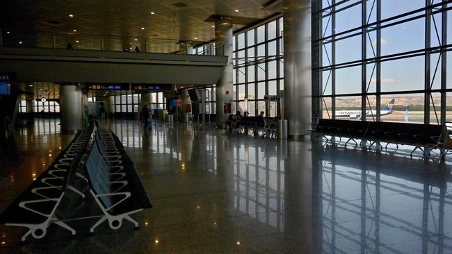 Empty rows of seats are pictured at the Madrid-Barajas Adolfo Suarez Airport in Barajas.