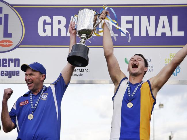 Garry Ramsay and captain Kane Shaw celebrate the 2015 triumph. Picture: Hamish Blair