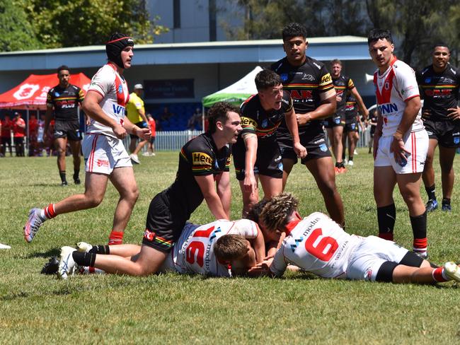 Penrith players claim a try in the SG Ball Cup. Picture: Sean Teuma/NewsLocal