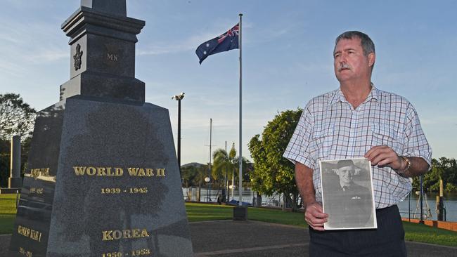 Bruce Gillan, in Innisfail yesterday, with a photo of his uncle Bruce Gillan who was listed as missing in action in the Korean War; below, some of the 43 Australian servicemen who were MIA. Picture: Brian Cassey