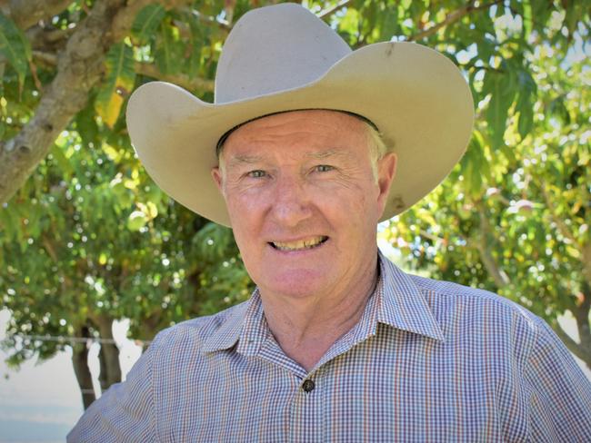 Whitsunday Park Estate developer and passionate Bloomsbury local, Garry Poole, in front of the mango trees at his home. Behind them is a large dam which had black swans swimming in it. Picture: Heidi Petith