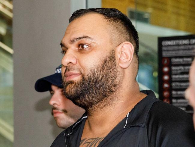 DAILY TELEGRAPH EXCLUSIVE - NO AUSTRALIAN, NO NEWS.COM.AU. . Federal police escort fugitive Alameddine crime figure Masood Zakaria out of Sydney Domestic Airport after he was deported from Turkey. Tuesday 05/12/2023. Picture by Max Mason-Hubers