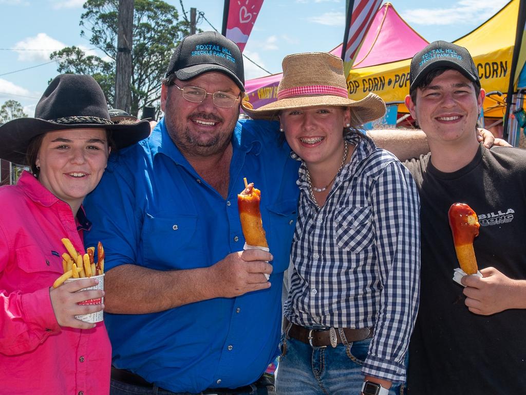 Kate Hepburn with Charlize Taylor, Jaden Taylor, and Wayne Hepburn enjoying all the spoils at the Kyogle Show. Picture: Cath Piltz