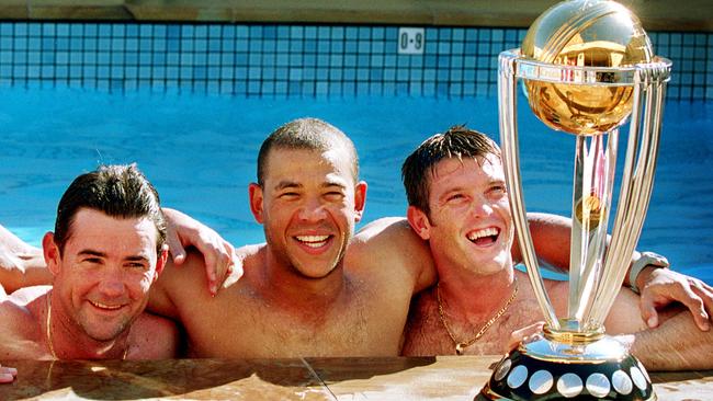 “Contiki Tourists” Jimmy Maher, Andrew Symonds and Ian Harvey with the 2003 World Cup trophy.