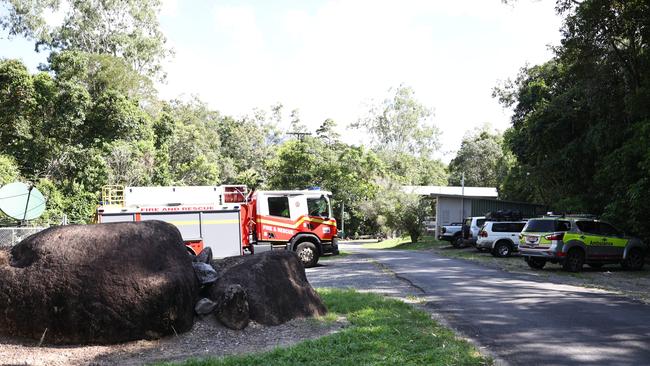 Emergency service vehicles including Queensland Fire Department and Queensland Ambulance Service at the entry of the Behana Gorge walking trail at Aloomba, south of Cairns.