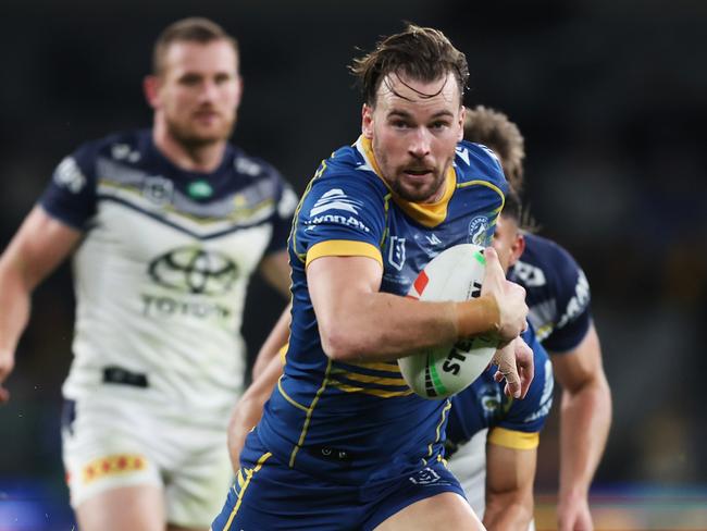 SYDNEY, AUSTRALIA - MAY 26: Clint Gutherson of the Eels makes a break during the round 13 NRL match between Parramatta Eels and North Queensland Cowboys at CommBank Stadium on May 26, 2023 in Sydney, Australia. (Photo by Mark Metcalfe/Getty Images)