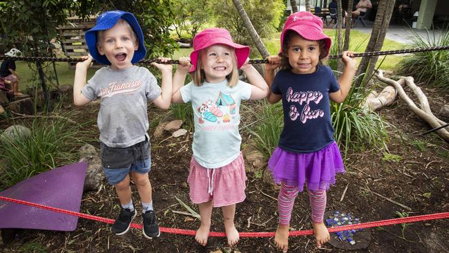 Van Kurz, Anna Madden and Ruby Baguley-Gela, aged 3, playing at Everton Park Child Care which has been rated excellent by the Australian Children's Education and Care Quality Authority. Photo Lachie Millard