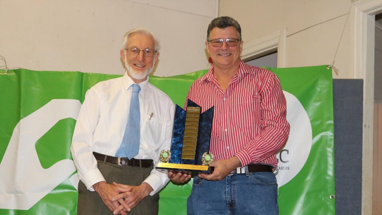 GOOD WORK: Condamine Catchment Management Association’s Dr John Standley (left) receives the Nicki Laws Perpetual Trophy from Dr Glen Laws as part of the 2019 competition.