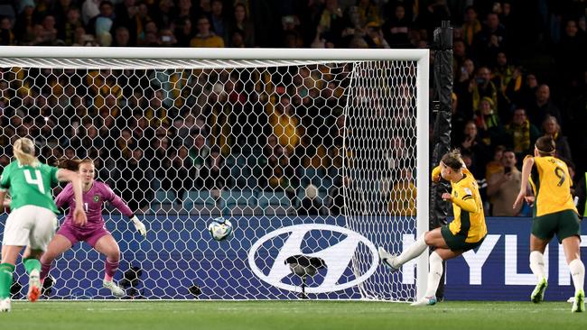 Stephanie Catley slots the historic goal on home soil. Photo by DAVID GRAY / AFP.