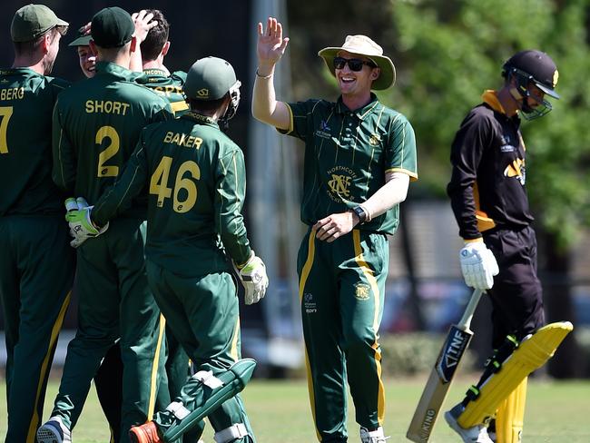 Northcote celebrate another wicket. Picture: Steve Tanner