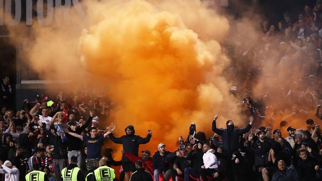 A flare is lit during last year’s FFA Cup semi-final between Western Sydney Wanderers and Sydney FC at Penrith. Picture: Getty Images