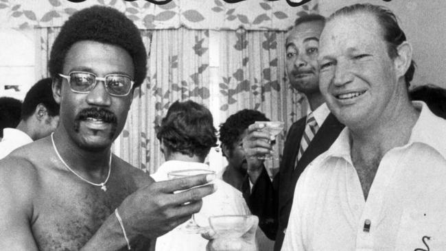 Media executive Kerry Packer (r) with West Indian cricketer Clive Lloyd drinking champagne at party for World Series Cricket 05 Feb 1978. (Pic: Ken Matts)