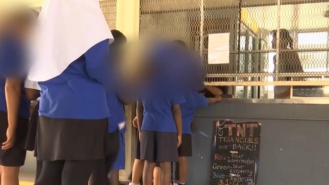 Students line up at Woodridge State School’s tuckshop in 2021. Picture: Contributed