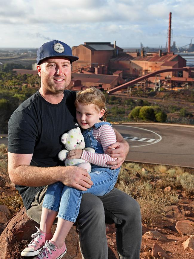 Alex Manners, a mine worker, with 4-year-old daughter Lila on Hummock Hill in Whyalla. Picture: Tom Huntley