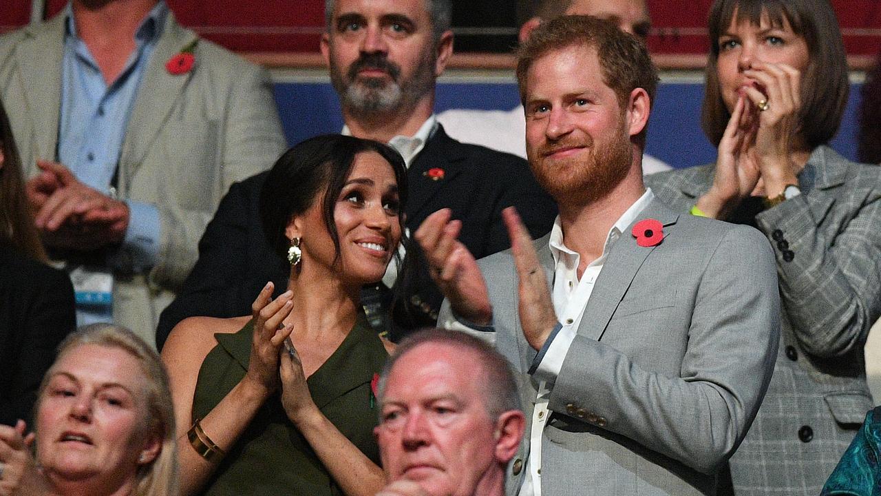 Britain's Prince Harry, the Duke of Sussex and his wife Meghan, the Duchess of Sussex are seen during the closing ceremony of the Invictus Games in Sydney, Australia, Saturday, October 27, 2018. Picture: AAP Image/Dan Himbrechts