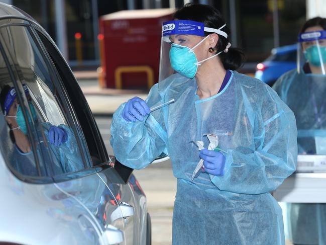 Australian Clinical Labs team members Sarah White and  Caitlin Walmsley prepare to begin screen in Geelong West. The labs will open a drive through COVID-19 testing site on the corner of Pakington St and Aberdeen St from Monday. Picture: Alan Barber