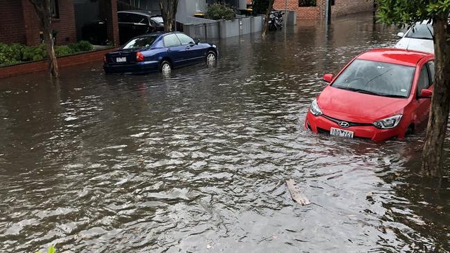 Cars on a flooded Richmond road. Picture: Twitter/@tomcrobertson