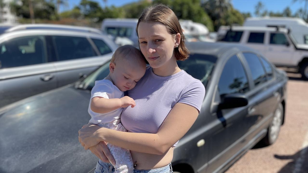21 year old mother India Sparks with her 15 month old daughter Violet and LPG run car which is stuck at Townsville's Sealink terminal because there's nowhere to refuel it.