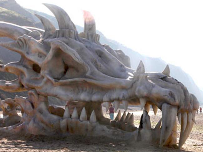 A 'skull' placed on a beach as part of a Game of Thrones promotion. Actual fossils of dinosaurs may have helped shape dragons in folklore. Picture: HBO Game of Thrones