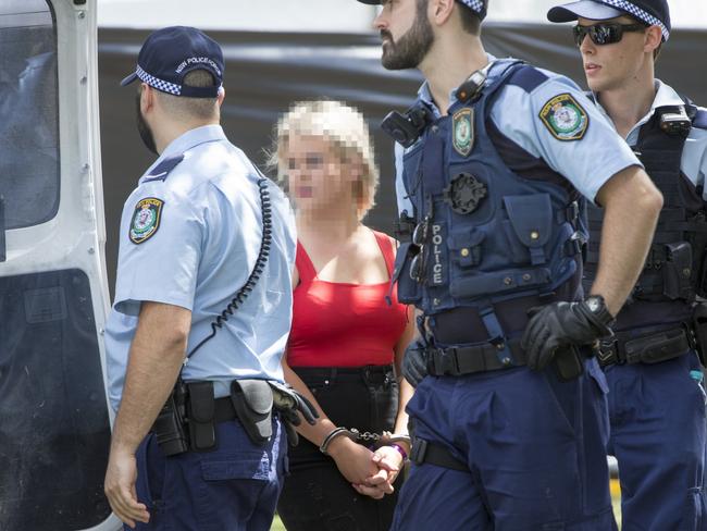 BLURRED FOR ONLINEA woman seen in handcuffs outside the Ultra Australia festival, at Parramatta Park, Sydney, 24th February 2019. Picture by Damian Shaw