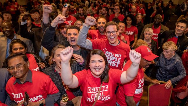 Labor supporters celebrate at Labor's election headquarters in Mulgrave. Picture: Jake Nowakowski