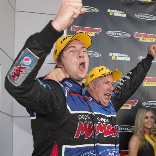 Chaz Mostert and Paul Morris celebrate their 2014 Bathurst 1000 win.