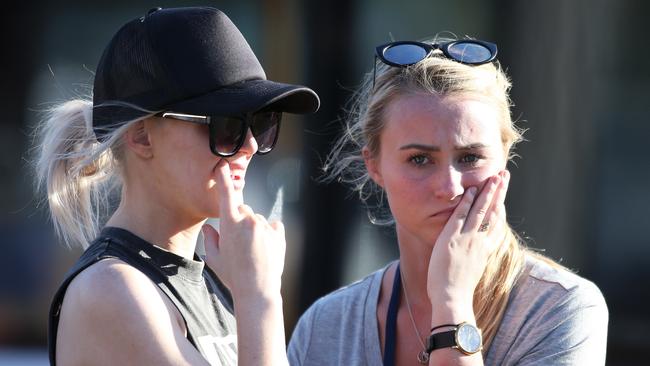 DISTRESS: Friends Clare Wooley  and Lia Capes come to terms with the tragedy. Picture: NIGEL HALLETT