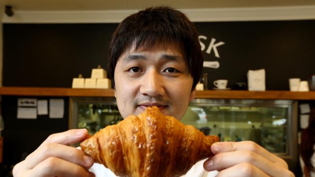 Pastry chef Justin Yu is the owner of The Whisk at Upper Mount Gravatt, his pastries are so popular he usually sells out before lunchtime. Picture: AAP/David Clark