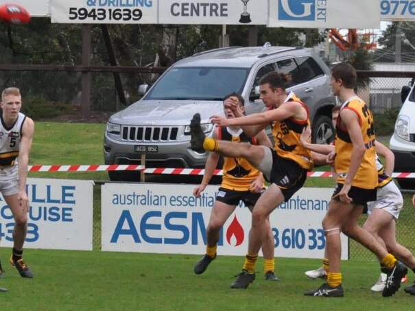 Patrick Gerdan takes a kick for the Stingrays. Pic: Stephen Hicks