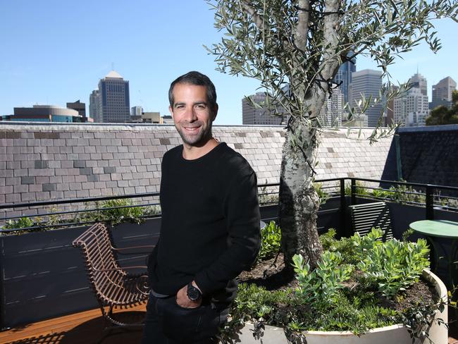 Hotelier Paul Fischmann poses at his Little Albion Guest House.