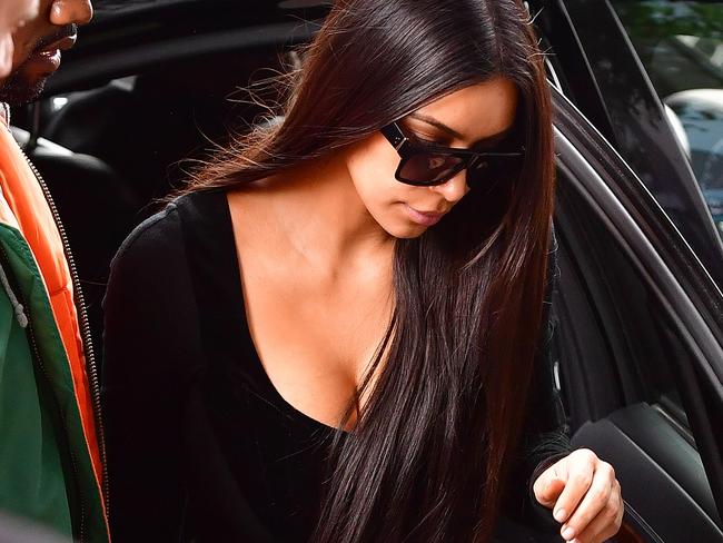 Kim returns to New York following the attack. She appears to not be wearing her engagement ring. Picture: Getty/ James Devaney/GC Images.