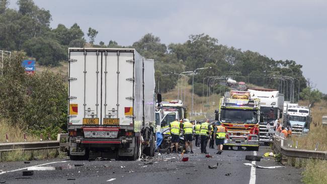 Fatal crash involving one car and two trucks on the Oakey Bypass, Warrego Highway. Tuesday, January 24, 2023. Picture: Nev Madsen.