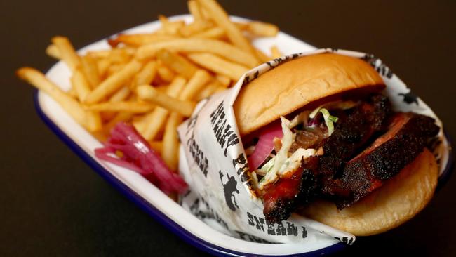 The brisket burger at the Sneaky Pickle in Millswood. Picture: Simon Cross