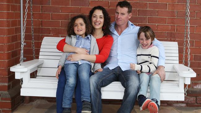 Anne-Maree Polimeni and Alan Wilson are running a special event in Kew on what would have been the first birthday of their son Rafael. The couple are pictured with their children Jude, 4, and Luis, 7. Picture: Stuart Milligan