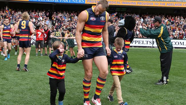 Adelaide great Ben Rutten with sons Bernie and Jack. Picture: Sarah Reed