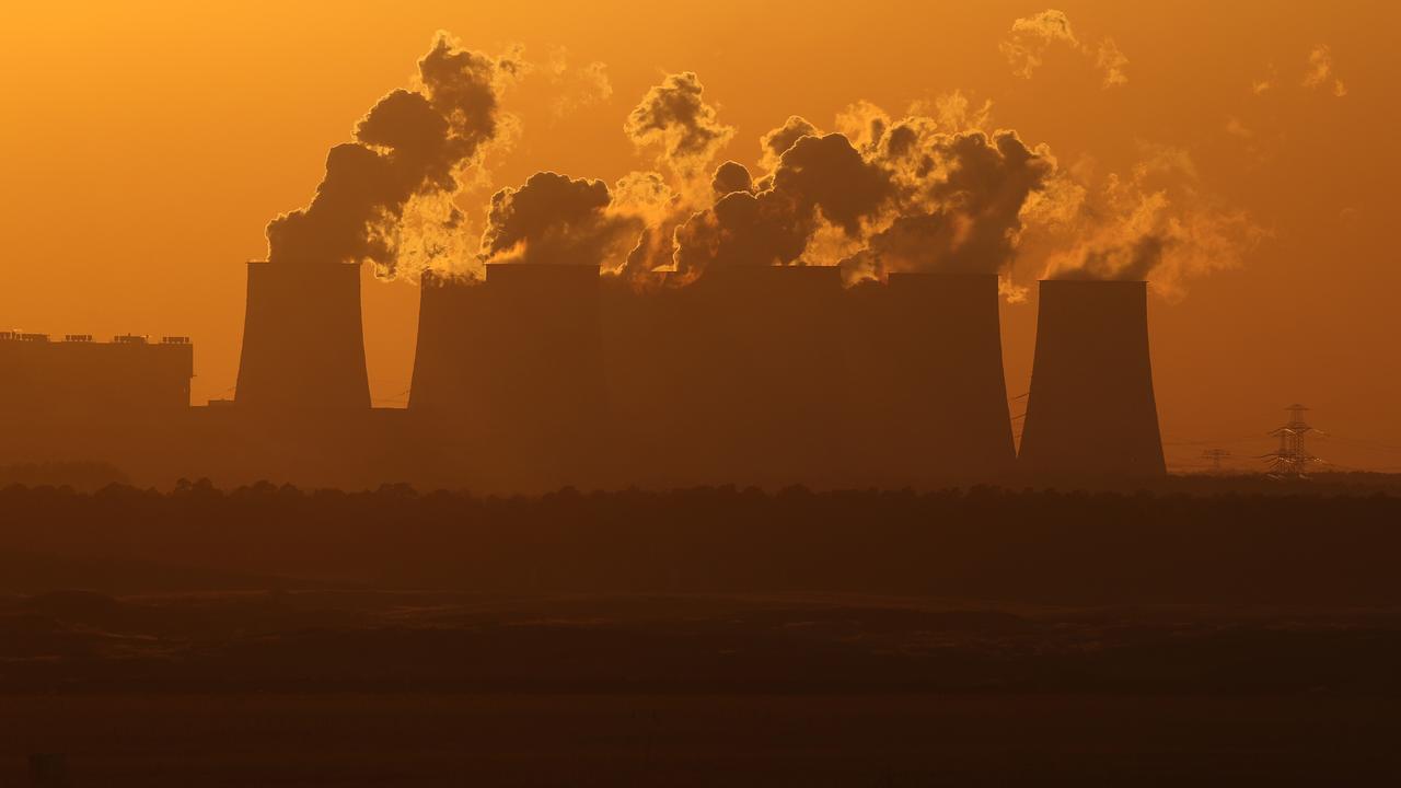 Steam rises from the cooling towers of the Jaenschwalde coal-fired power plant near Griessen in Germany. Picture: Getty Images