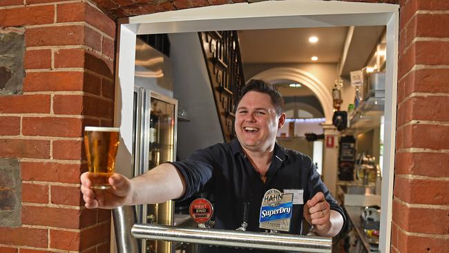 Drinking beer while standing up has been allowed again, as long as it’s outside. Picture: Tom Huntley