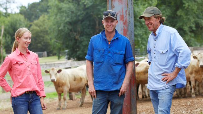 Millie Ritchie, employee Toby Humphrey and Mark Ritchie on Delatite Station. Photo: Coles