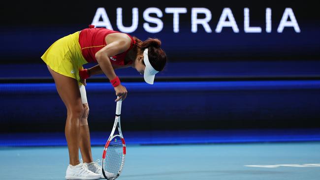 Gao Xinyu of Team China reacts to cramp. Photo by Will Russell/Getty Images.