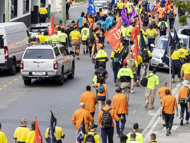 CFMEU members walk down Stratton Street in Newstead, on their way to William Street on Tuesday to demand the resignation of long-time Department of Transport and Main Roads Director-General Neil Scales. Picture: Supplied