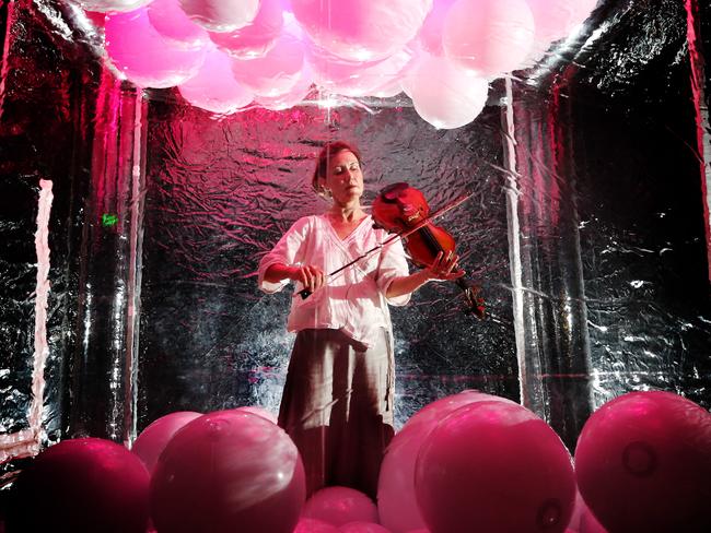 Violinist Anna McMichael performs in the Sound Bubble at Inveresk, Launceston, as part of Mofo. PICTURE CHRIS KIDD