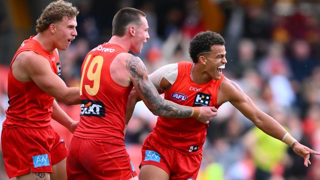 The Suns’ usual red and yellow home strip. (Photo by Matt Roberts/AFL Photos/via Getty Images)