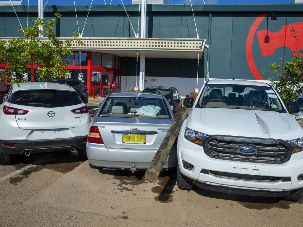 And again after the flood: Cars were seen scattered throughout the carpark along with debris after the flood had subsided. Picture: Media Mode