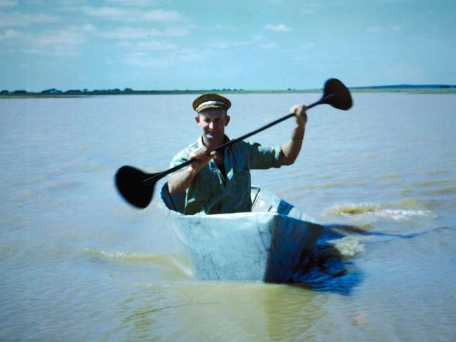 Family friend and neighbour Alex Sampson in Barry Koch’s hand-built canoe. Picture: Emma Brasier