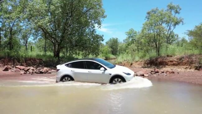 Tesla takes on flood water